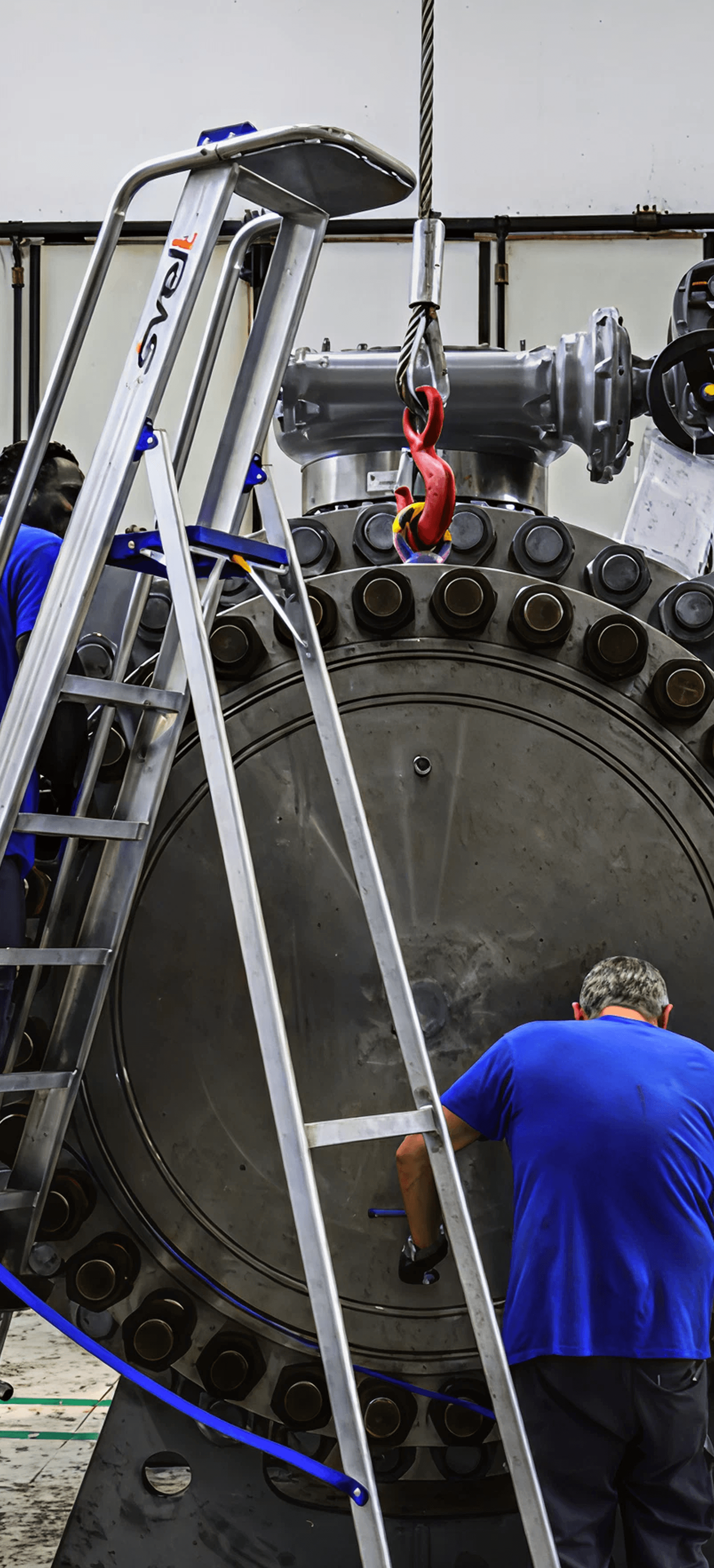 Petrolvalves being inspected by a team of engineers.